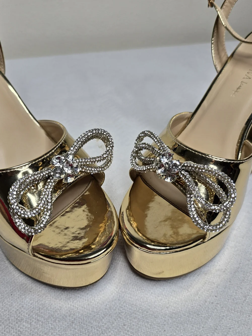 Gold Platform Sandals with Crystal Bow Accent